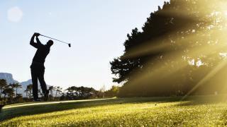 man golfing