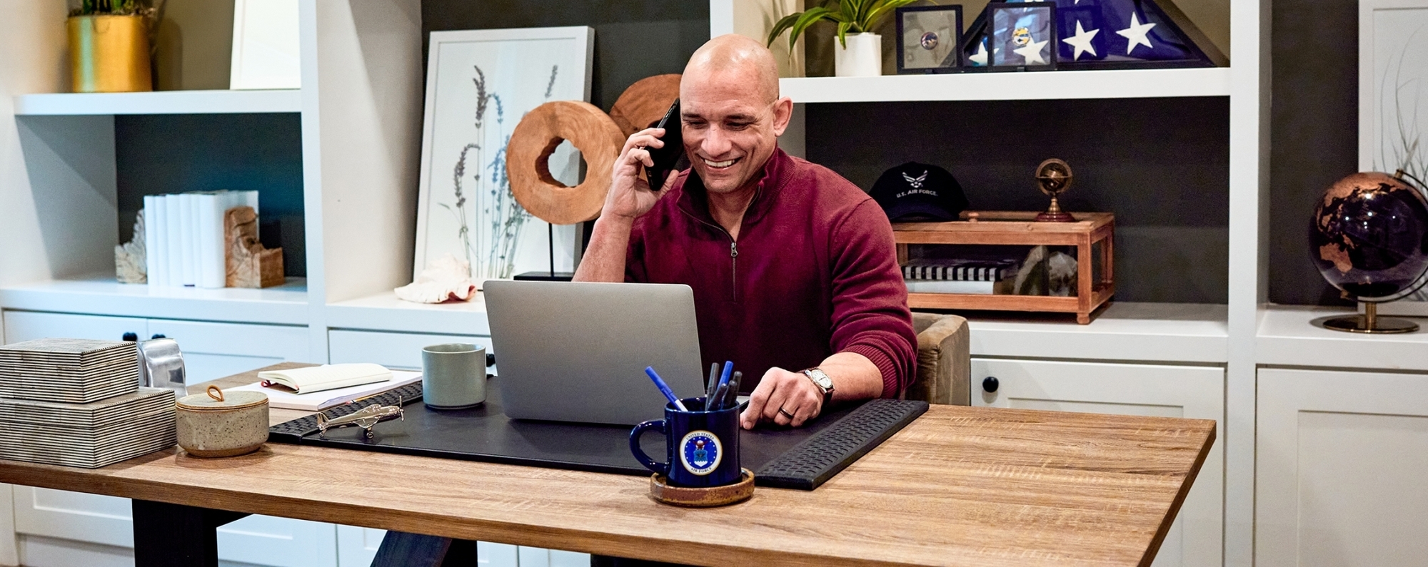 man on the phone in his home office