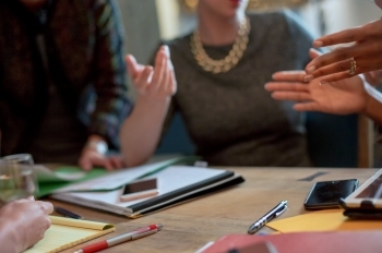 people talking at table
