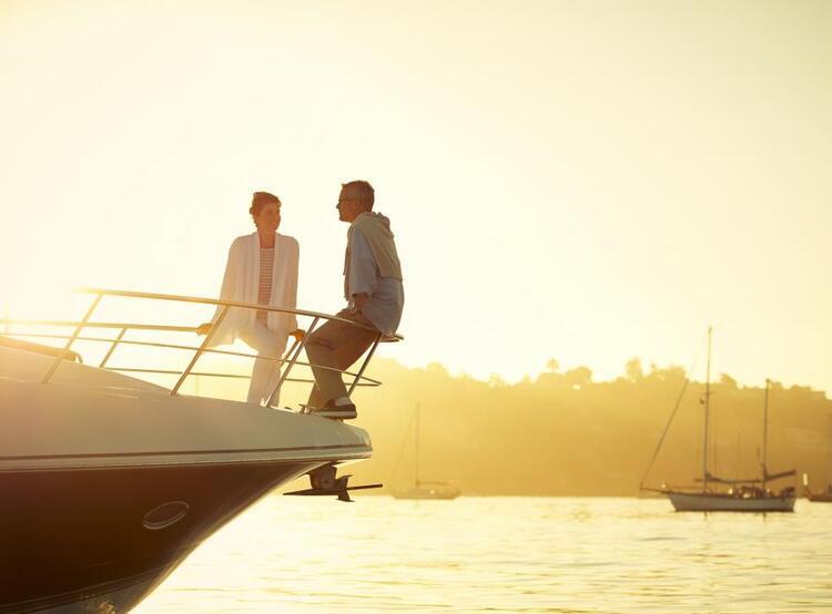 couple on boat at sunset