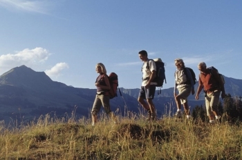 people hiking in mountains