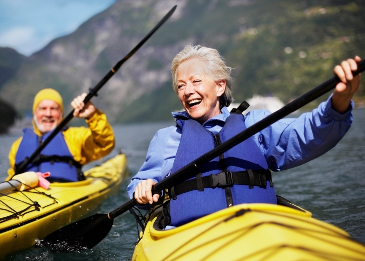 retired couple kayaking