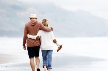 Couple walking on beach