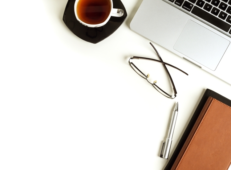 laptop and coffee on table