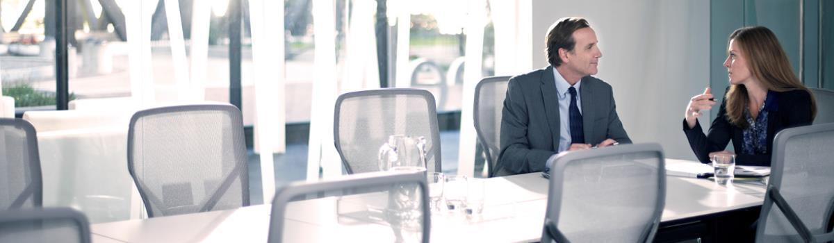 Financial Advisors at a conference table