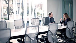 Financial Advisors at a conference table