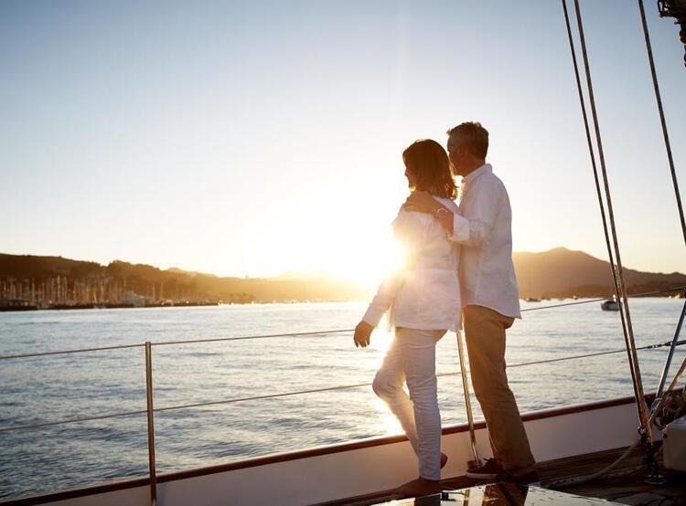 couple on boat at sunset