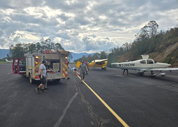 volunteers on runway ready to help