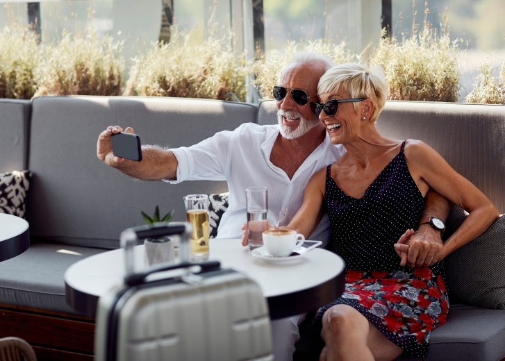 Retired Couple Takes Selfie at lunch