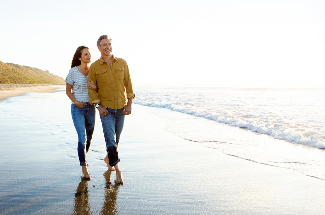 couple walking along beach