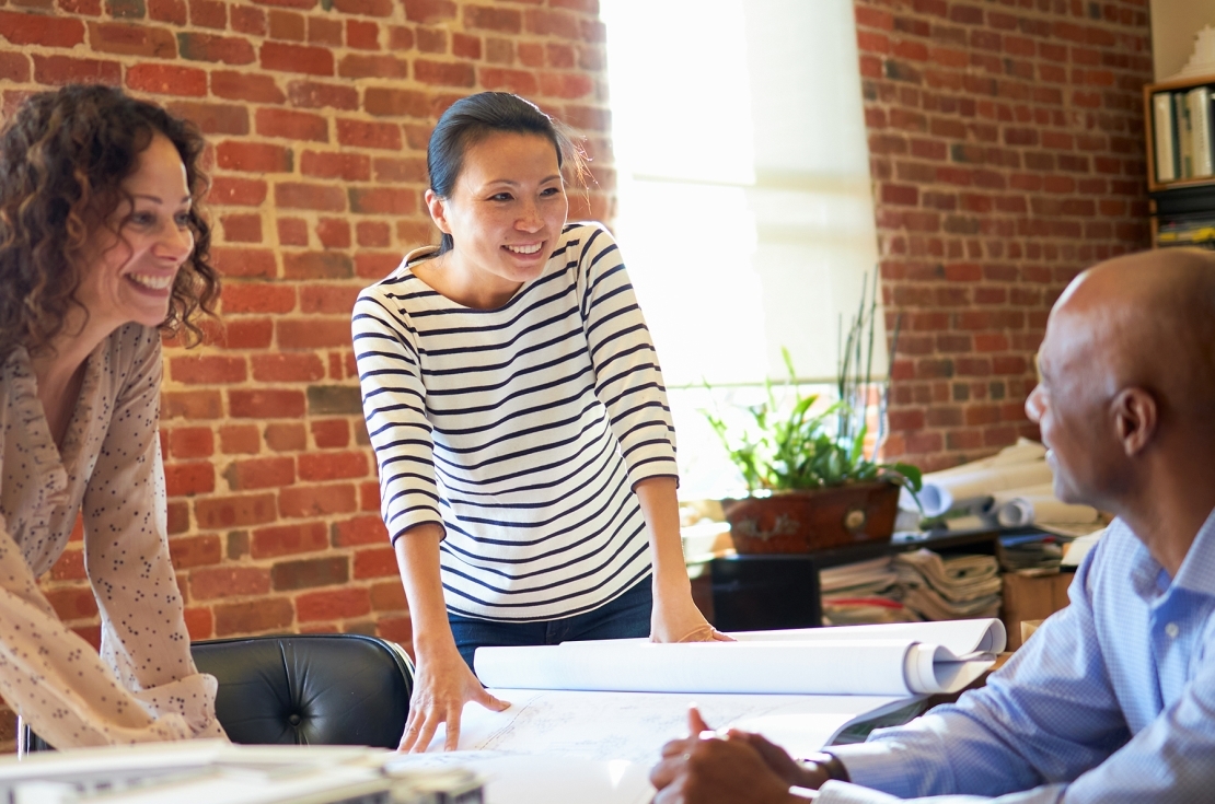 3 business people talking