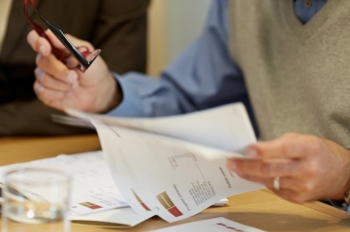 Financial Advisor going over paperwork with client