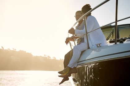 couple on a boat on the lake