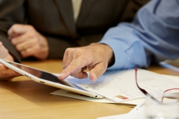 person looking at tablet