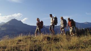 people hiking in the mountains