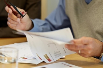 Financial Advisor going over paperwork with client
