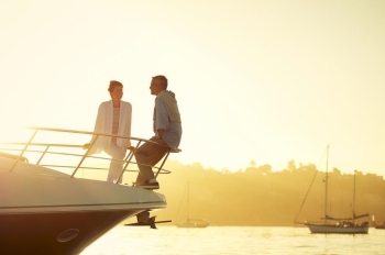 couple on boat at sunset