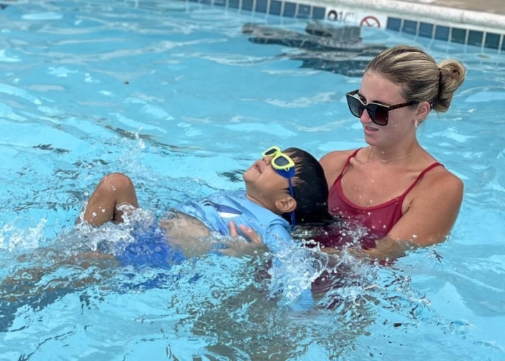 teaching swim lessons