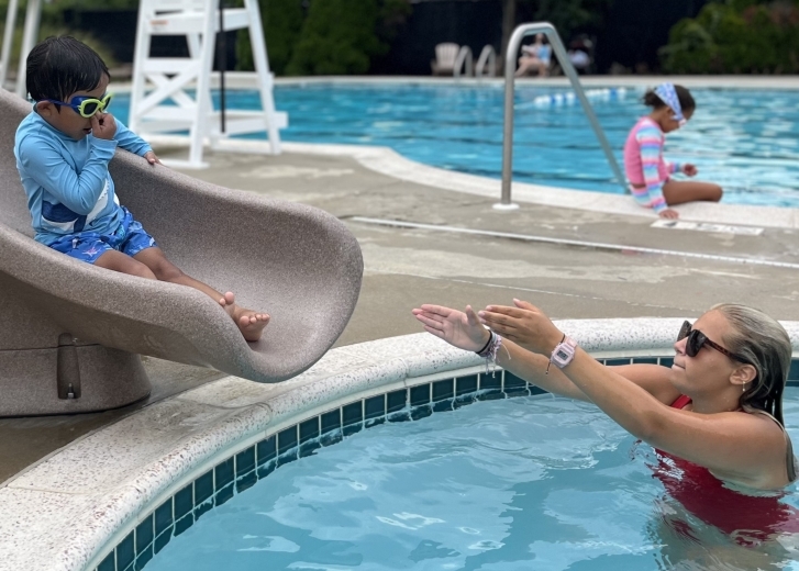 catching a child on the slide