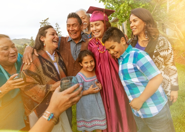 family celebrating graduate