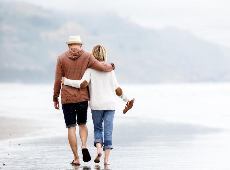 Couple walking on beach