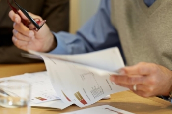 Financial Advisor going over paperwork with client