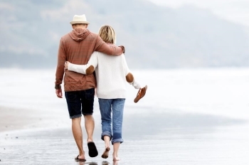 Couple walking on beach