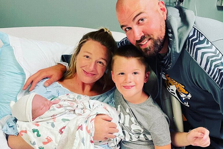 First picture at the hospital of Sean, his wife Maegan, son Beau, and newborn Brook