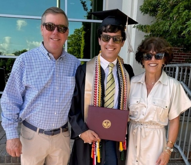 Oliver and her husband Parker at the PGA Championship in Rochester NY