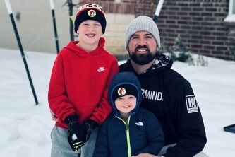 Sean and Maegan on a snowmobile in Telluride, Colorado