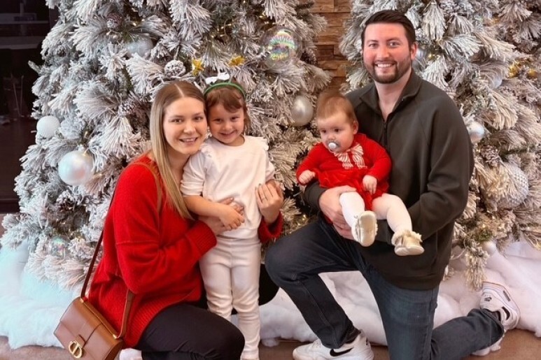 Taylor, and husband Parker, with their daughters Peyton and Palmer at Christmas