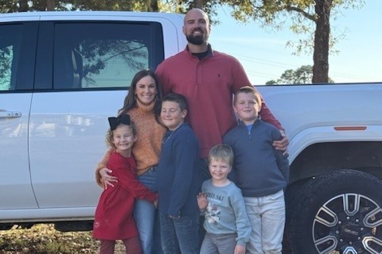 Sean, his fianc&eacute; Emily, and their 4 children