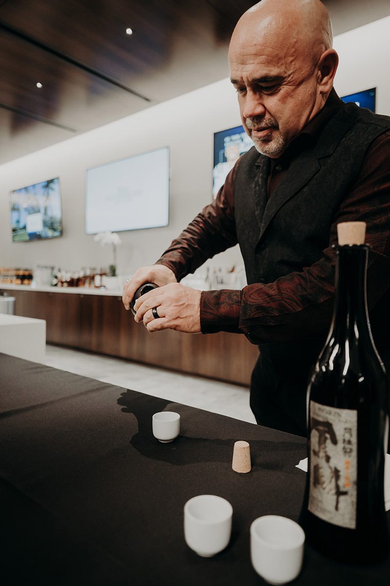 wine tasting host pouring a glass