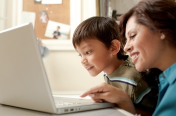 mom and son at laptop