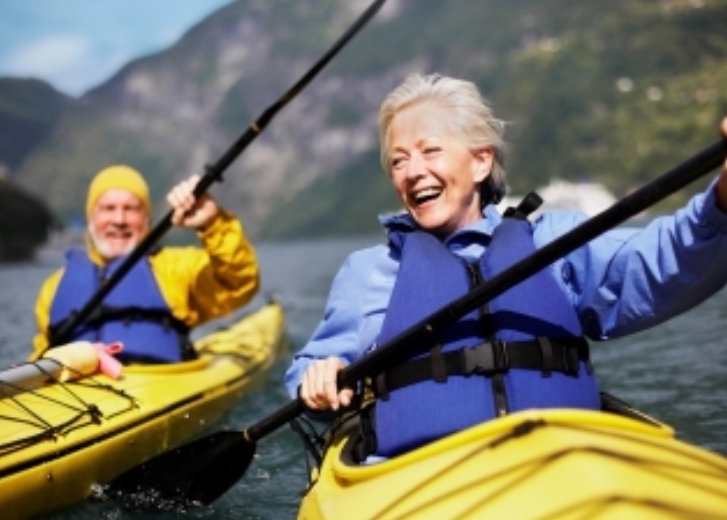 senior couple kayaking